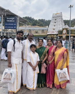 Group of devotees outside Tirumala temple after darshan